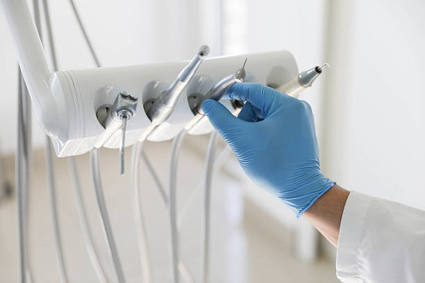 Professional Root Canal Treatment technician working in New London, TX
